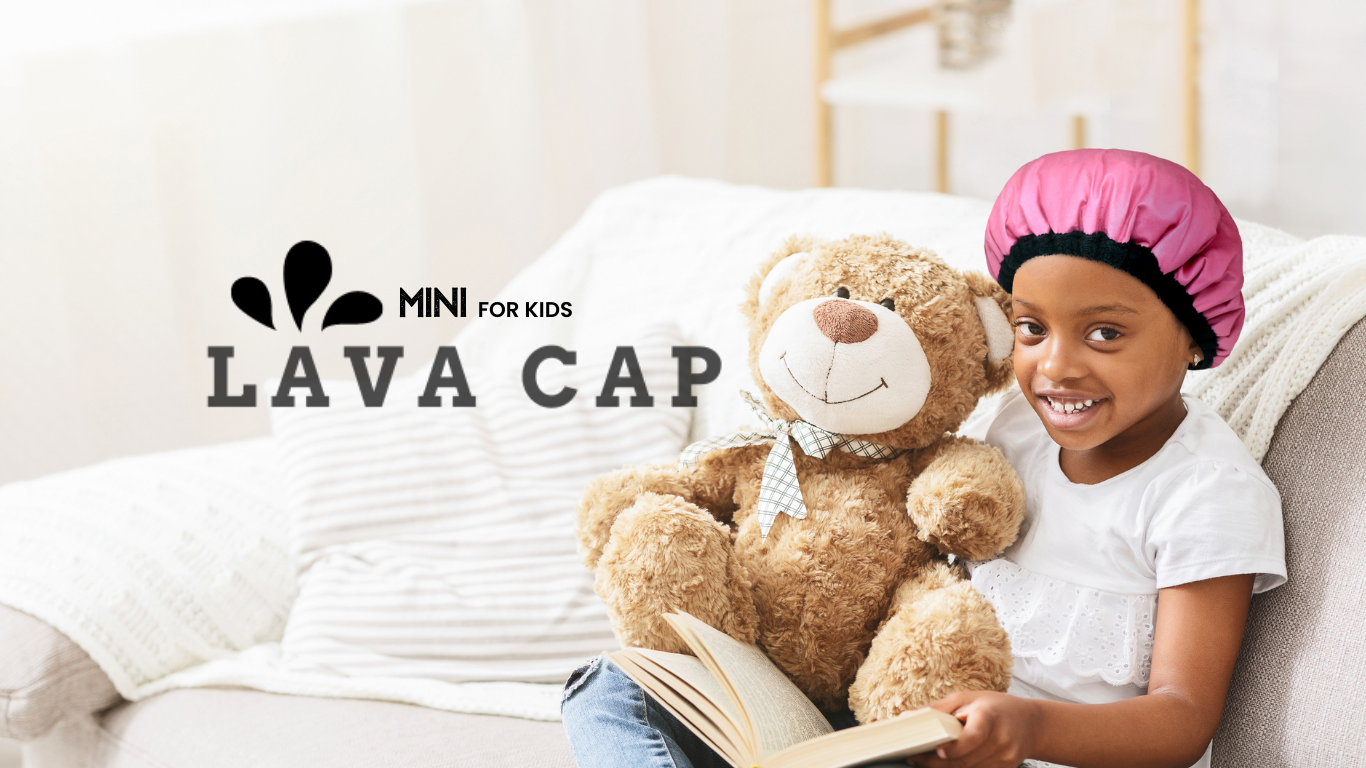 Smiling girl child wearing mini pink deep conditioning heat cap for hair| Lava Cap microwavable conditioning cap UK stock available